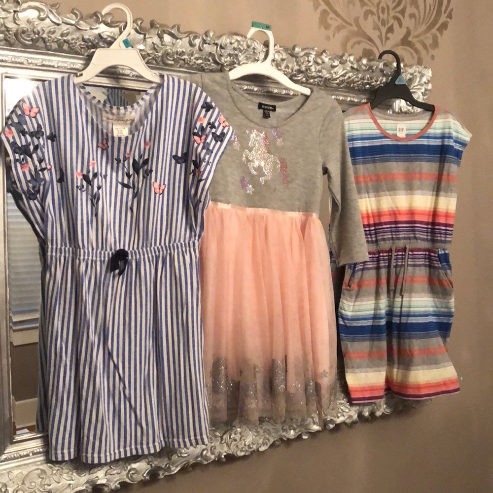 3 dresses, sizes 6-8. Excellent used condition.